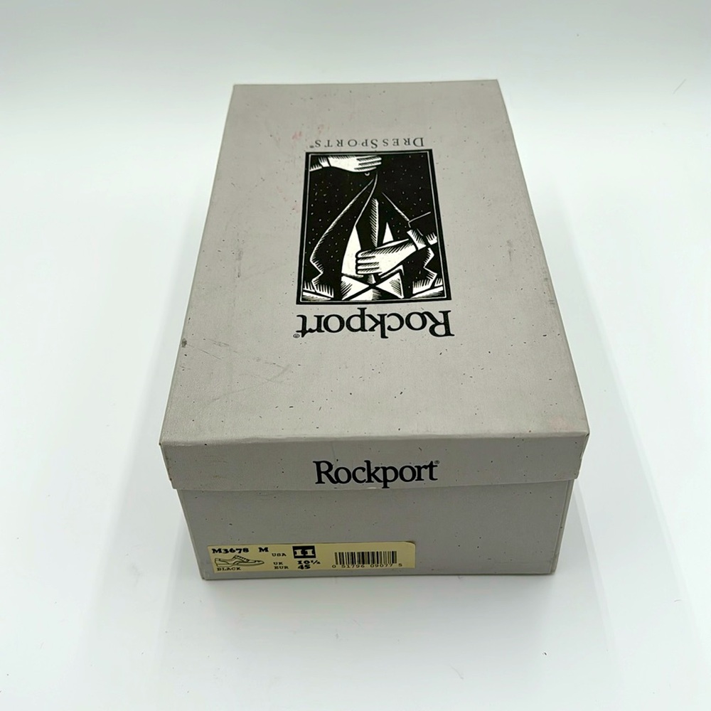 Rockport Lightweigh, men's size 11 N, black, Wingtips with Vibram soles.